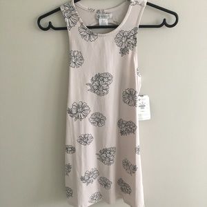 Pink floral patterned dress with open back.